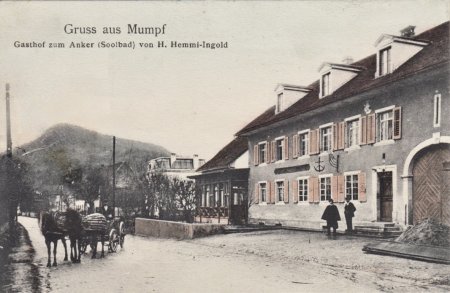 Ansichtskarte - _Anker_ Pferdefuhrwerk auf der Hauptstrasse - ©Reto Hofer